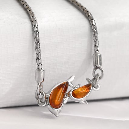 Strieborný jantárový náramok s delfínmi Laban