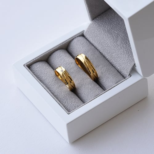 Elegantné zlaté svadobné prstene s diamantom Weber