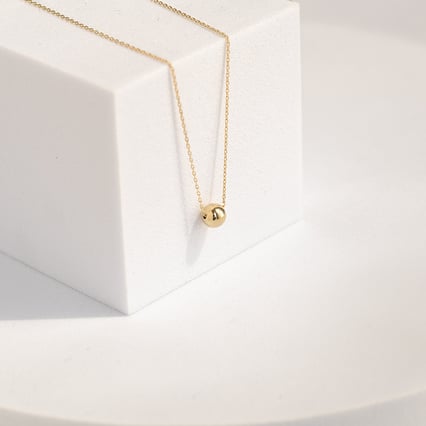 Zlatý set šperkov s guličkou Juelz