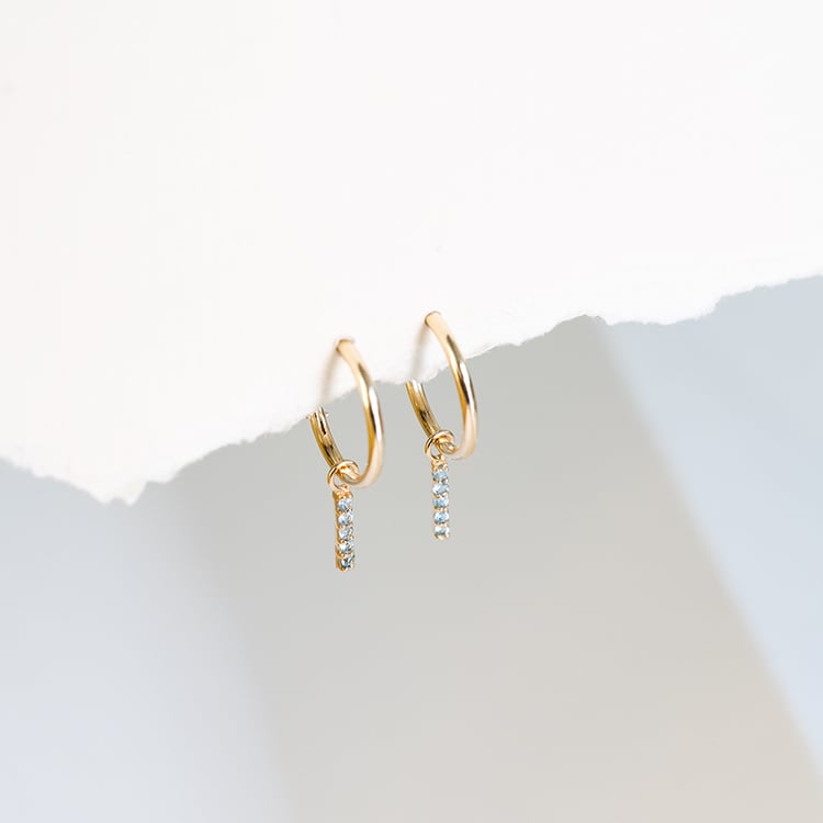 Zlaté visiace náušnice s modrými topásmi Christy 122998