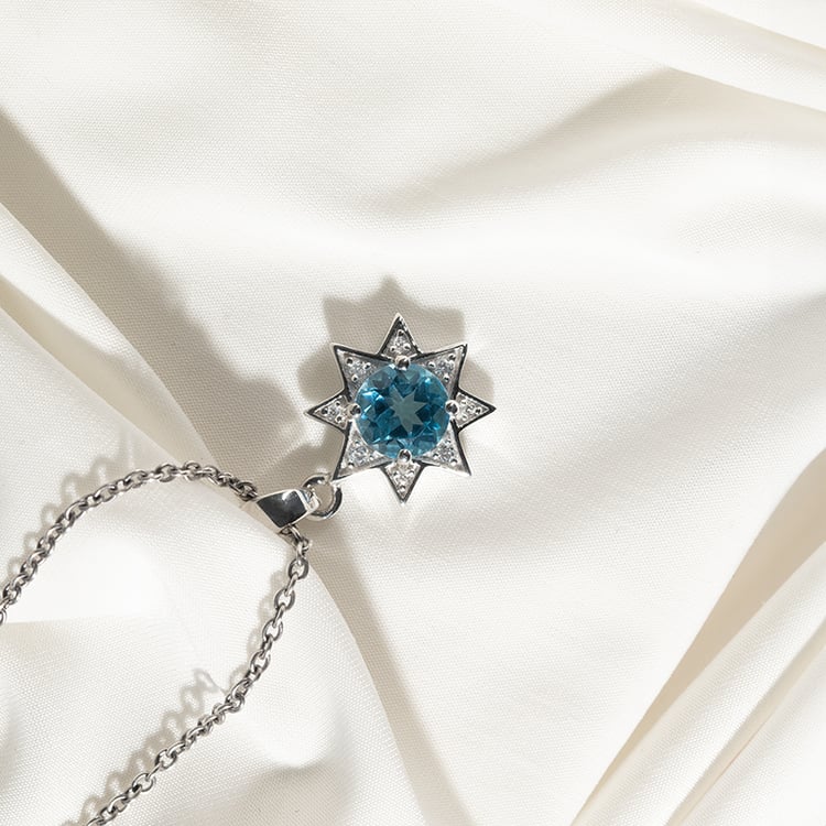 Strieborný prívesok s topásom a zirkónmi v tvare hviezdy Korey 135143