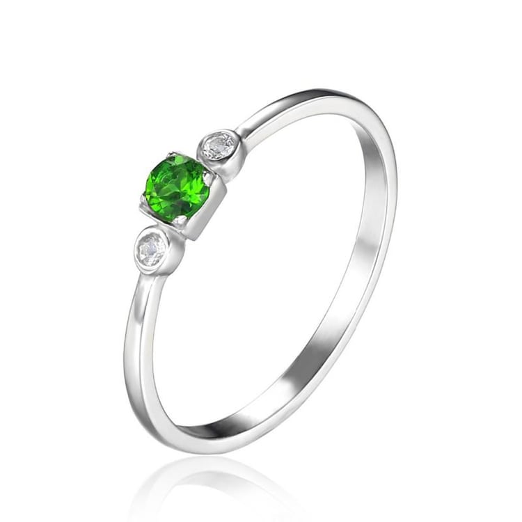 Strieborný prsteň s diopsidom a topásmi 