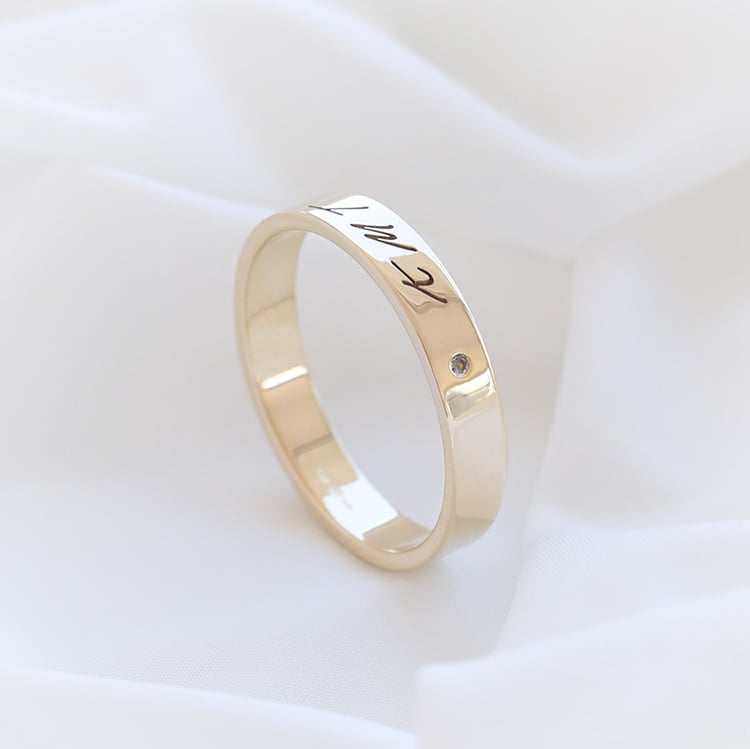 Zlatý prsteň s diamantom a gravírom 93485