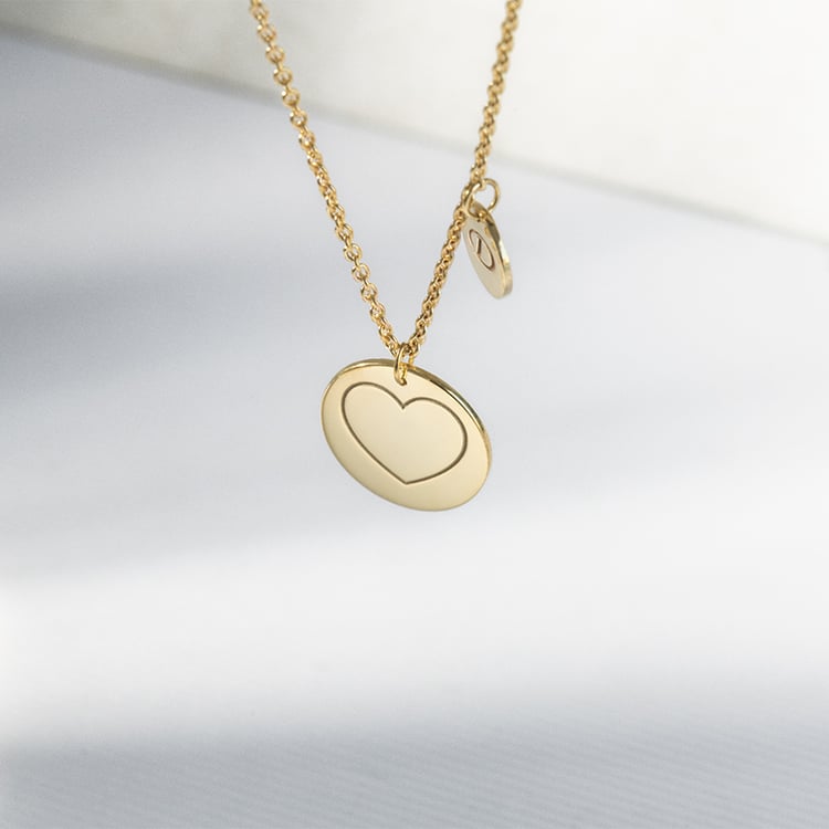 Náhrdelník so srdcom a gravírom písmena Teddie 121828