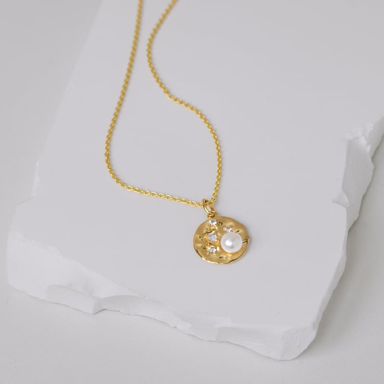 Strieborný prívesok s perlou a bielymi topásmi Alex 164104