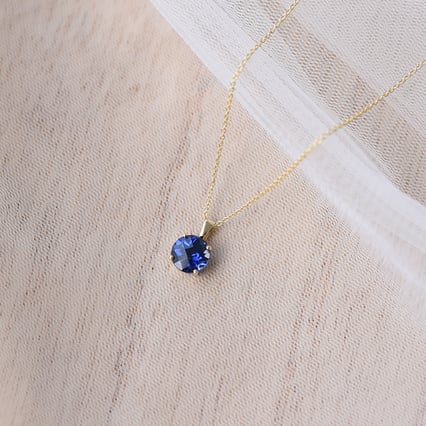 Zlatý prívesok s modrým zafírom Atik