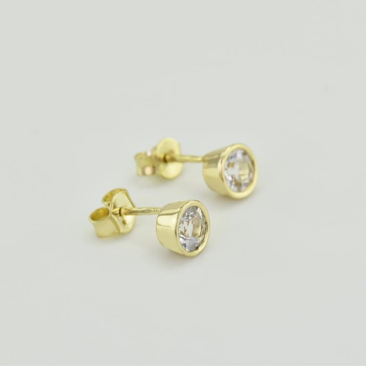 Strieborné bezel náušnice s bielymi topásmi Wetty 102817