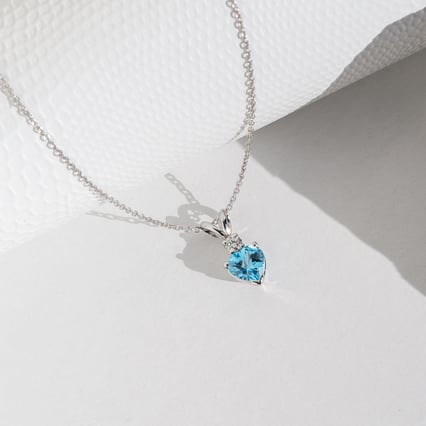 Zlatý prívesok s topásom a diamantom Demelda