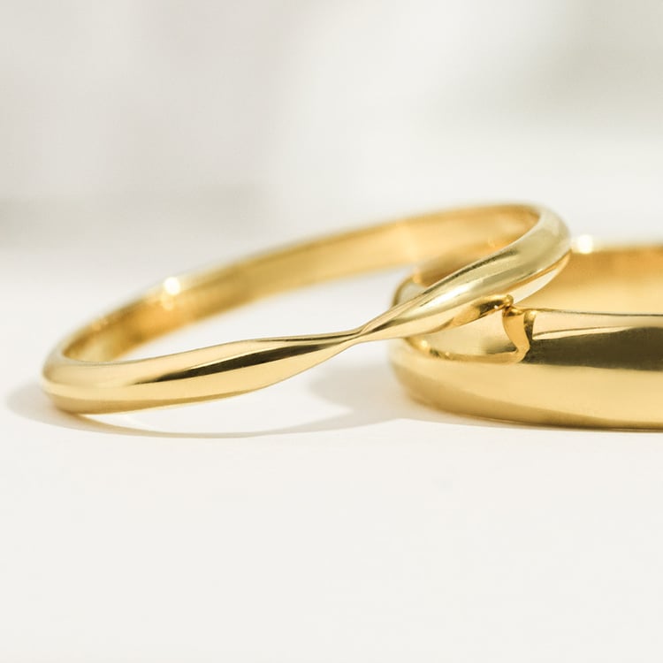 Zlaté svadobné prstene so zúženou dámskou obrúčkou Aello 156777