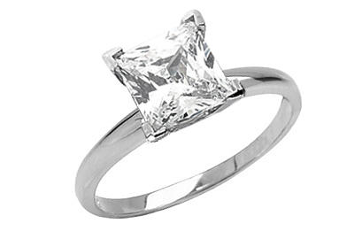 Zásnubný prsteň z bieleho zlata s diamantom.