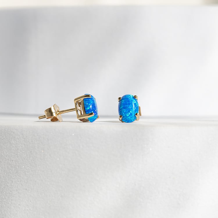 Modré oválne opály v zlatých náušniciach Jalia 145534