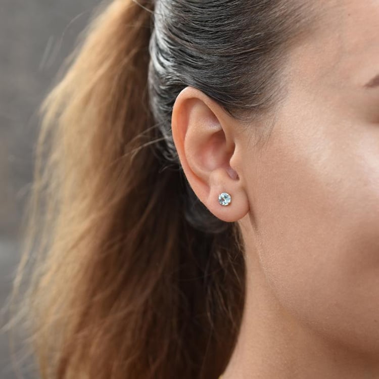 Zlaté napichovacie náušnice s topásmi 55343