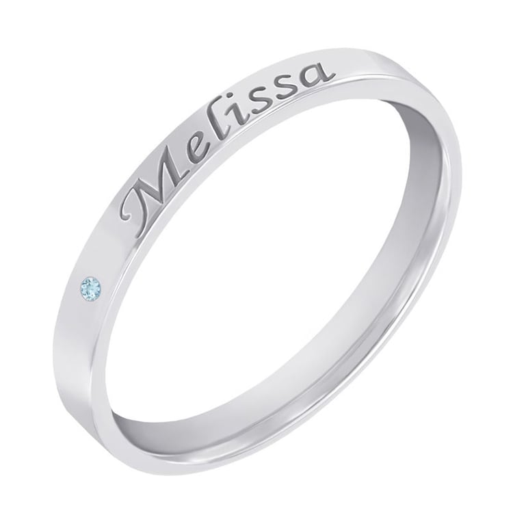 Zlatý prsteň s drahokamom a gravírom