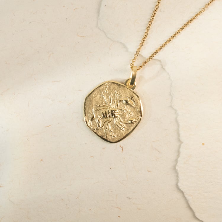 Zlatý prívesok so symbolmi znamenia zverokruhu 143663