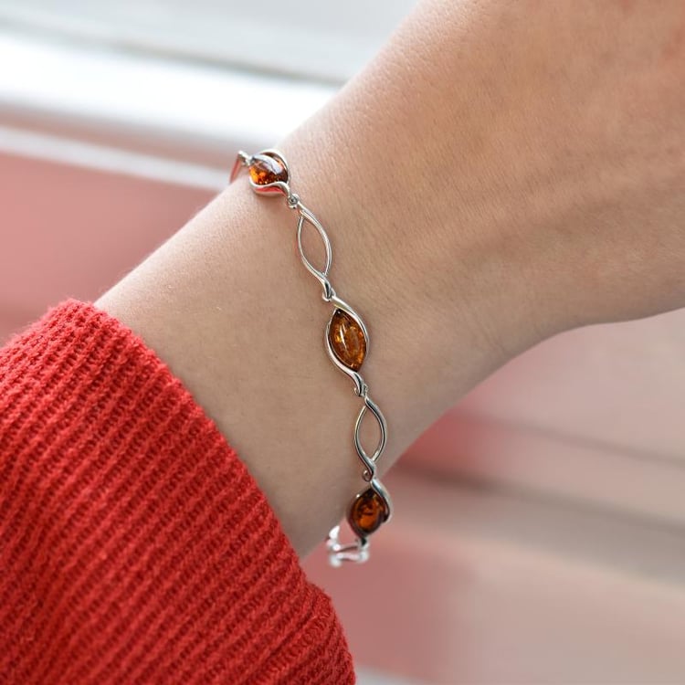 Štýlový strieborný náramok s jantármi 27115