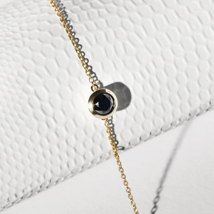 Zlatý náramok s čiernym diamantom Rollie