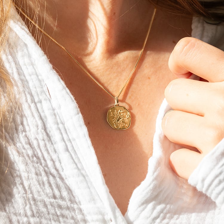 Zlatý prívesok so symbolmi znamenia zverokruhu 145607