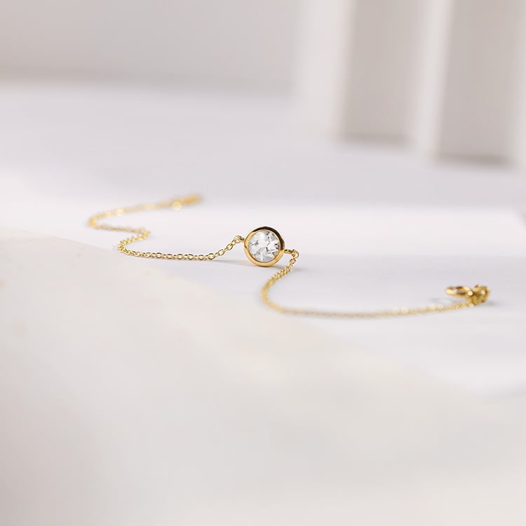 Zlatý náramok s bielym topásom Rollie 153088