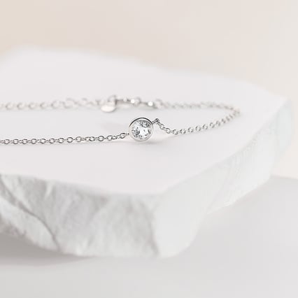 Platinový náramok s bielym topásom Rollie