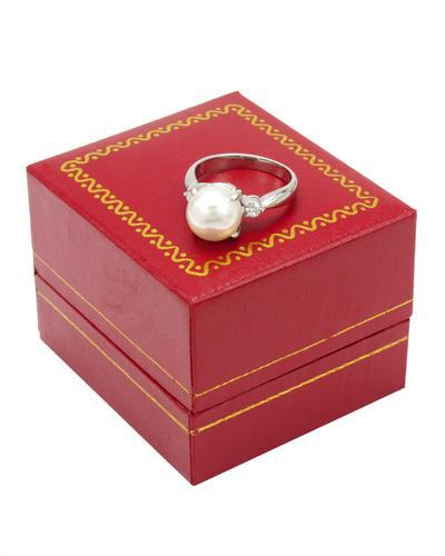 Platinový prsteň s perlou a diamantmi 3782