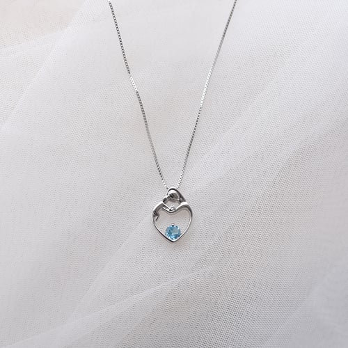 Prívesok matka a dieťa so švajčiarskym topásom a diamantom Heli
