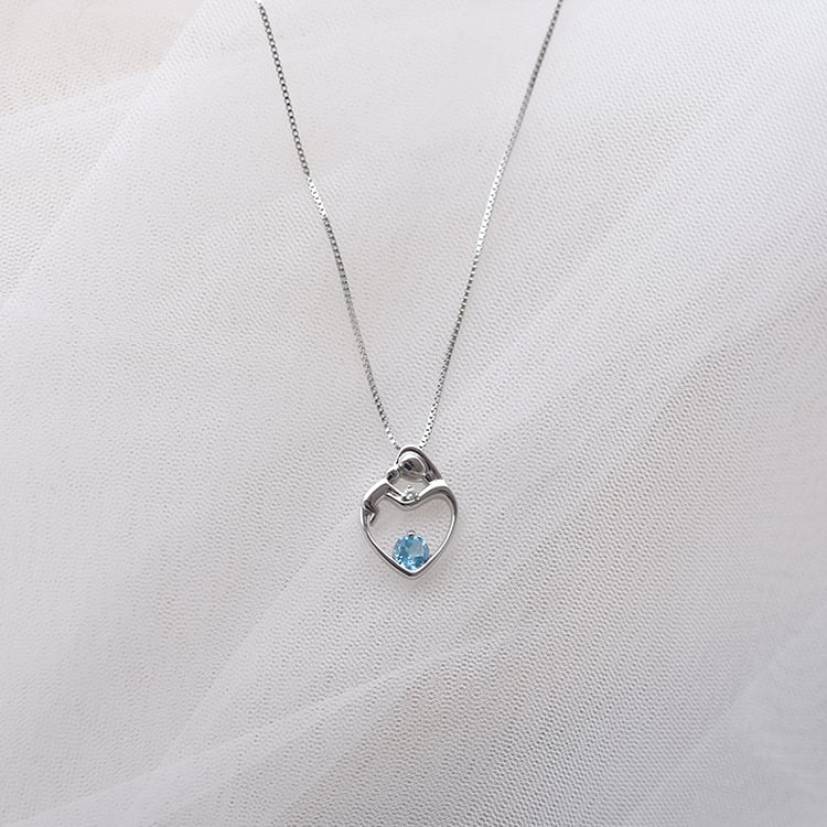 Prívesok matka a dieťa so švajčiarskym topásom a diamantom Heli 146329