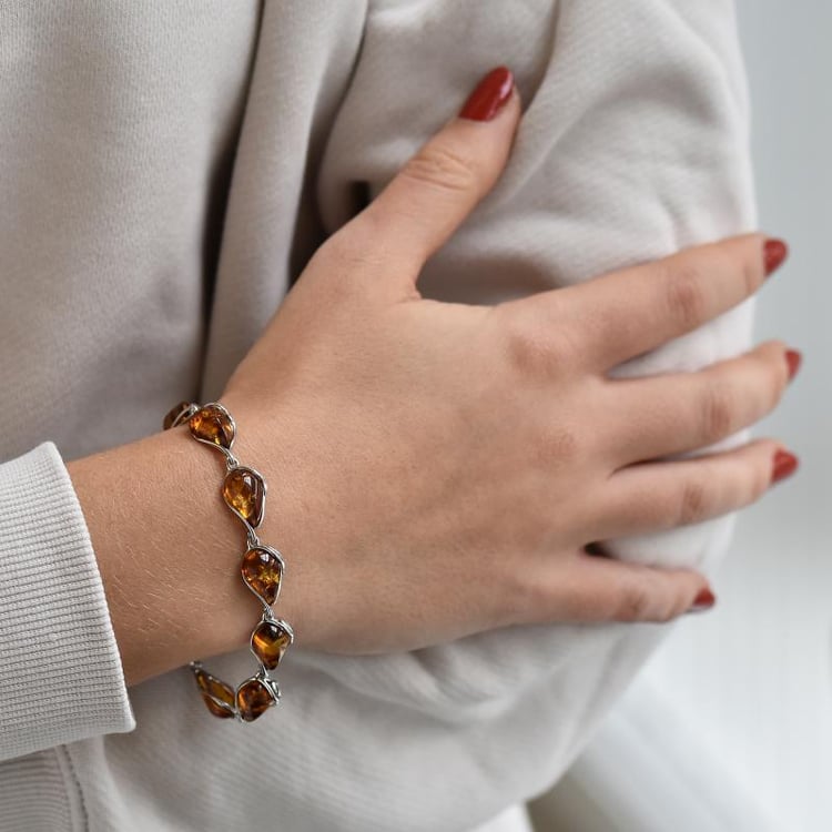 Strieborný náramok s jantármi 36917