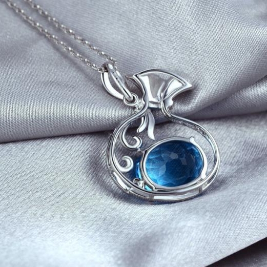 Zlatý mešec s topásom 3598