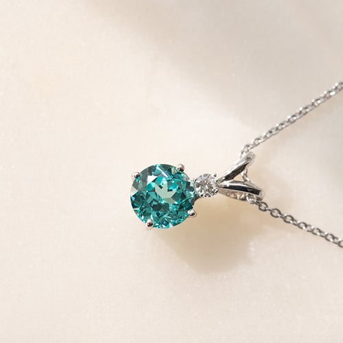 Zlatý prívesok s okrúhlym lab-grown paraiba turmalínom a diamantom Bernardo