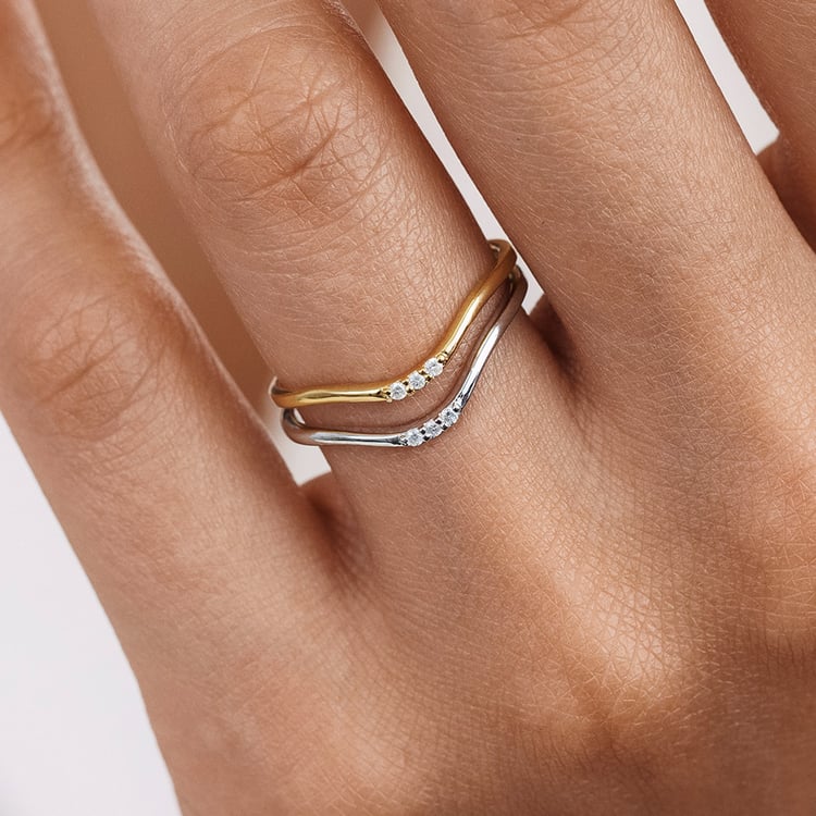 Strieborný vykrojený prsteň s tromi diamantmi Cason 157749