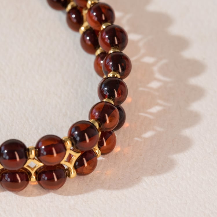 Strieborný pozlátený náramok s jantármi v tmavočerešňovej farbe Nordica 101118