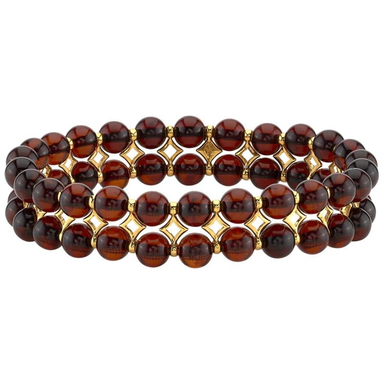 Strieborný pozlátený náramok s jantármi