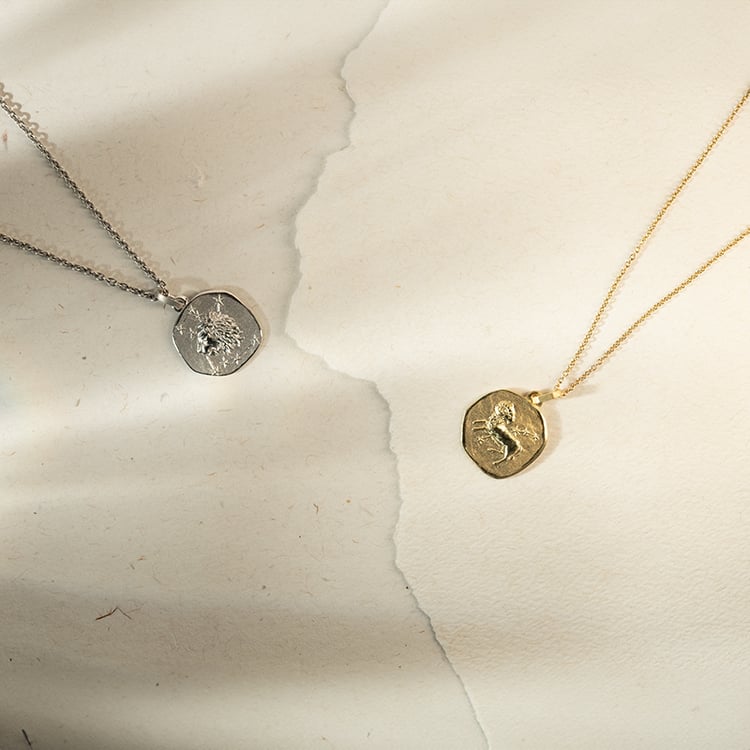 Zlatý prívesok so symbolmi znamenia zverokruhu 143624