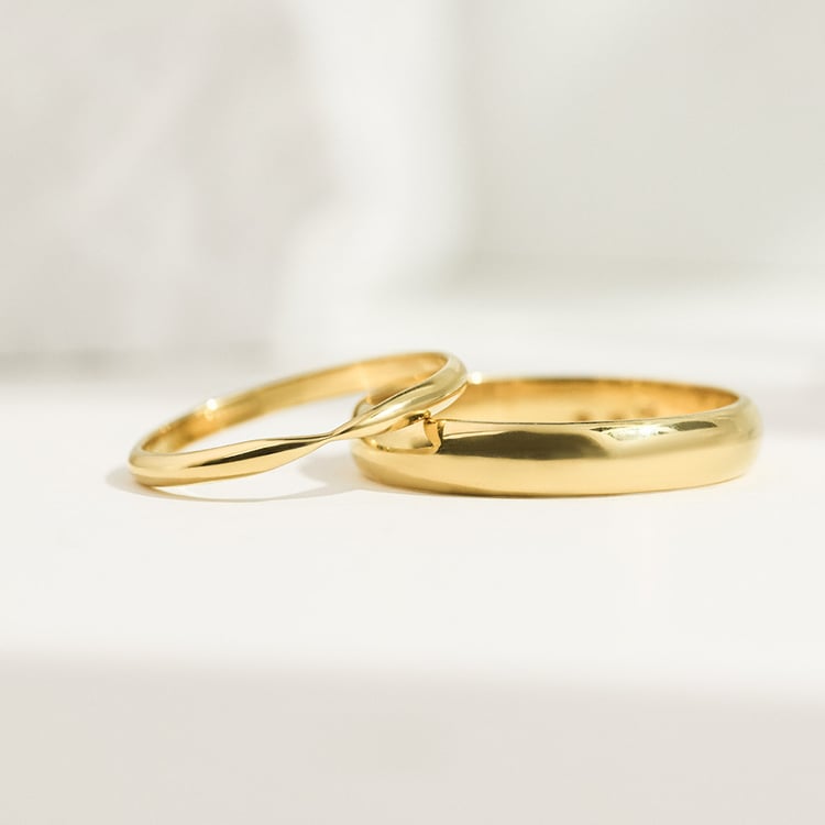 Zlaté svadobné prstene so zúženou dámskou obrúčkou Aello 156776