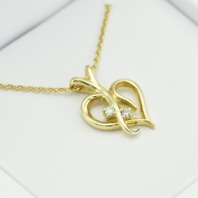 Strieborný prívesok v tvare srdca s diamantmi Elyzza 103329