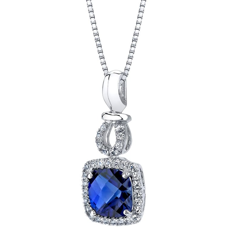 Zlatý prívesok so zafírom a topásmi Habib