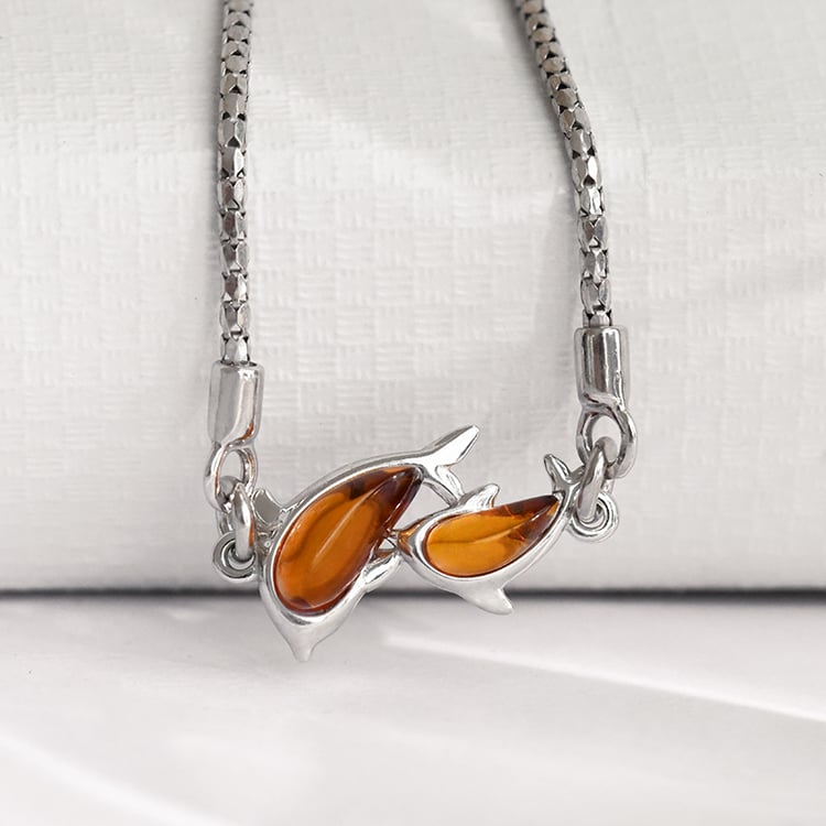 Strieborný jantárový náramok s delfínmi Laban 118839