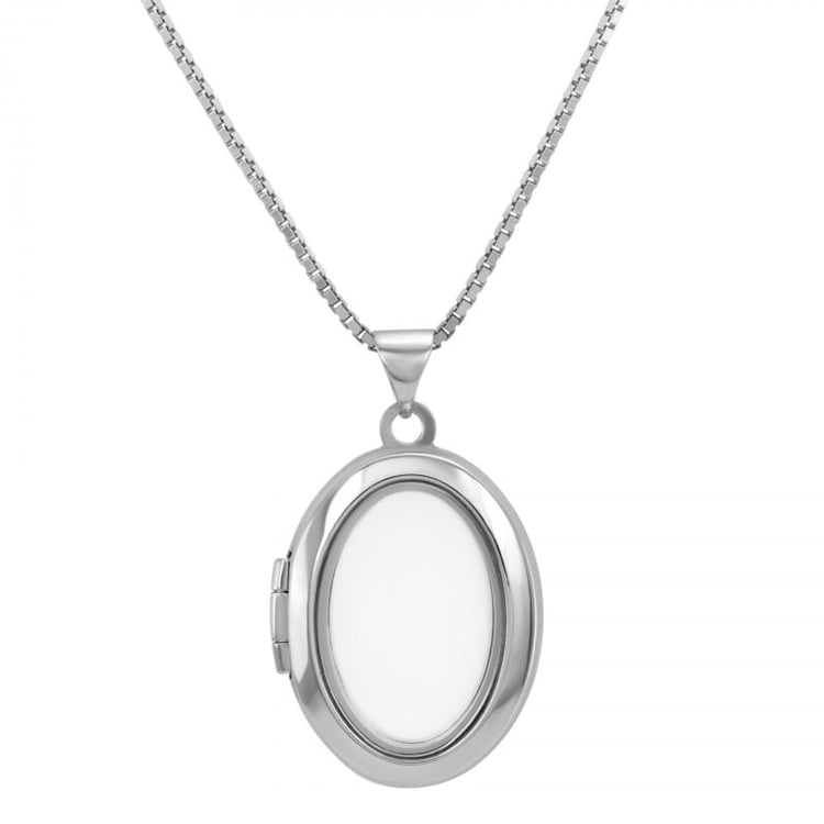 Strieborný medailón s priehľadným vnútrom