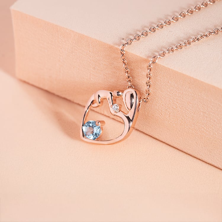 Prívesok matka a dieťa so švajčiarskym topásom a diamantom Heli 151233