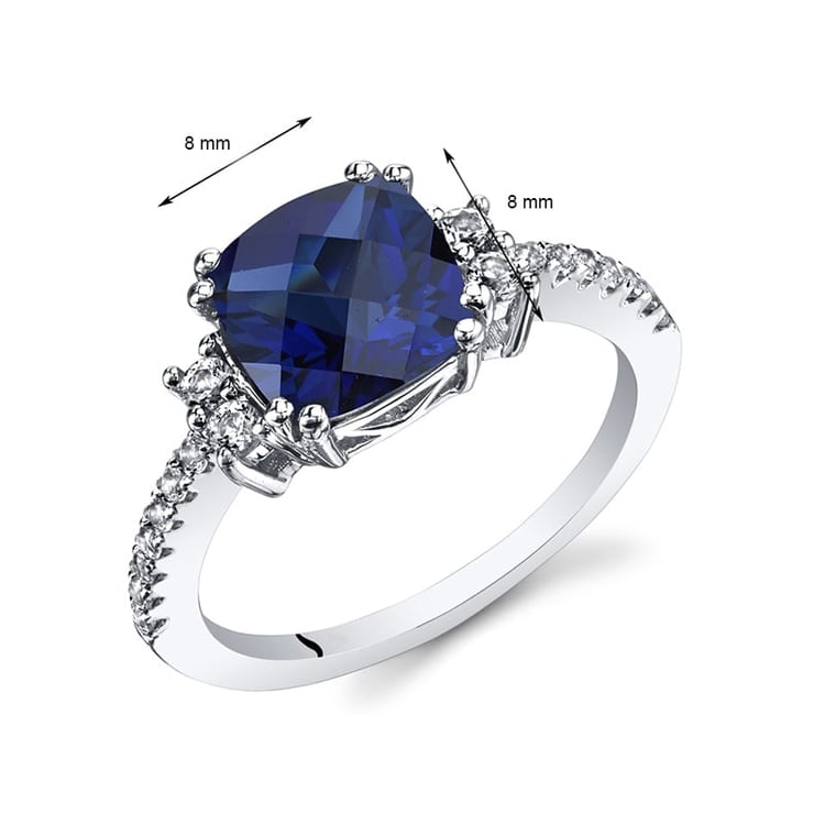 Zlatý prsteň so zafírom a topásmi 27359