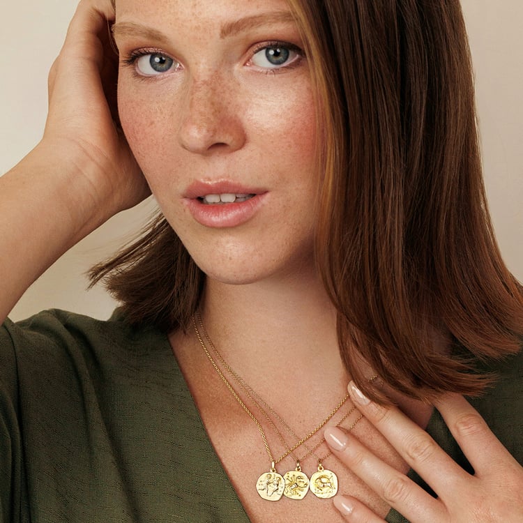 Zlatý prívesok so symbolmi znamenia zverokruhu 161314