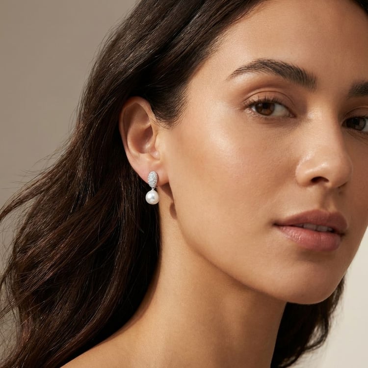 Strieborné minimalistické visiace náušnice s perlou a zirkóny Manu 166317