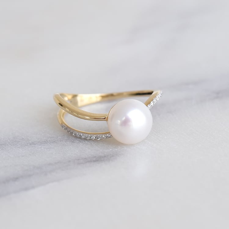 Elegantný prsteň s perlou a diamantmi 86670