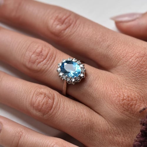 Prsteň s modrým topásom a diamantmi Zanite