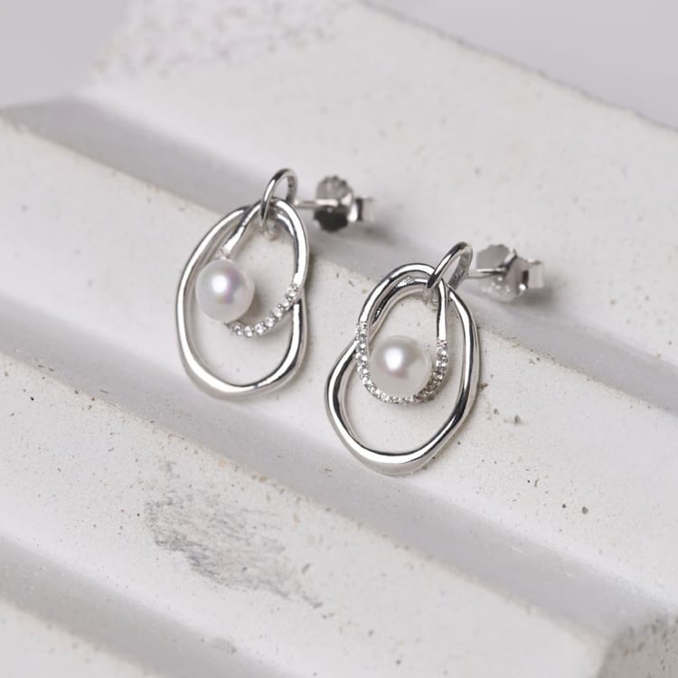 Strieborné perlové náušnice s bielym topásom 164011