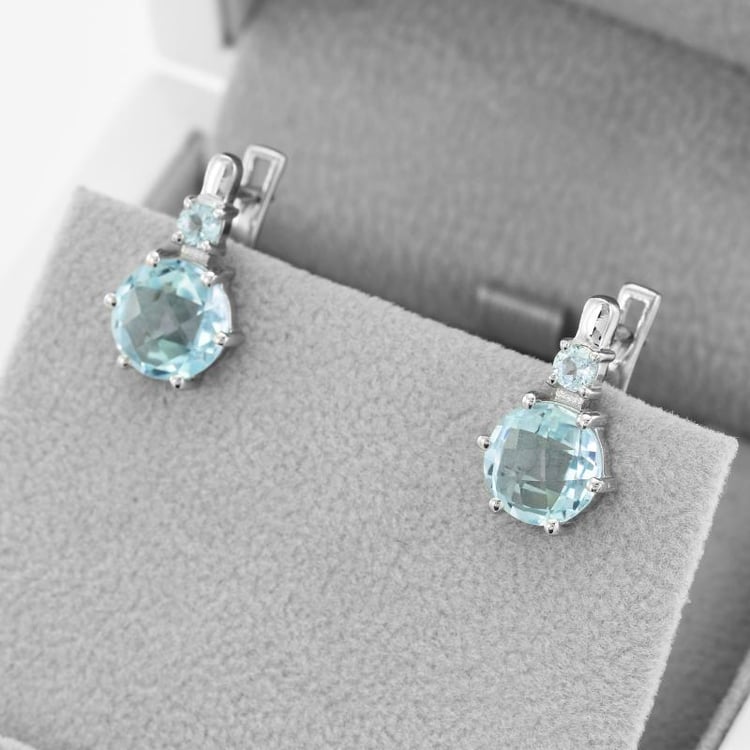 Strieborné visiace náušnice s modrými topásmi 48966