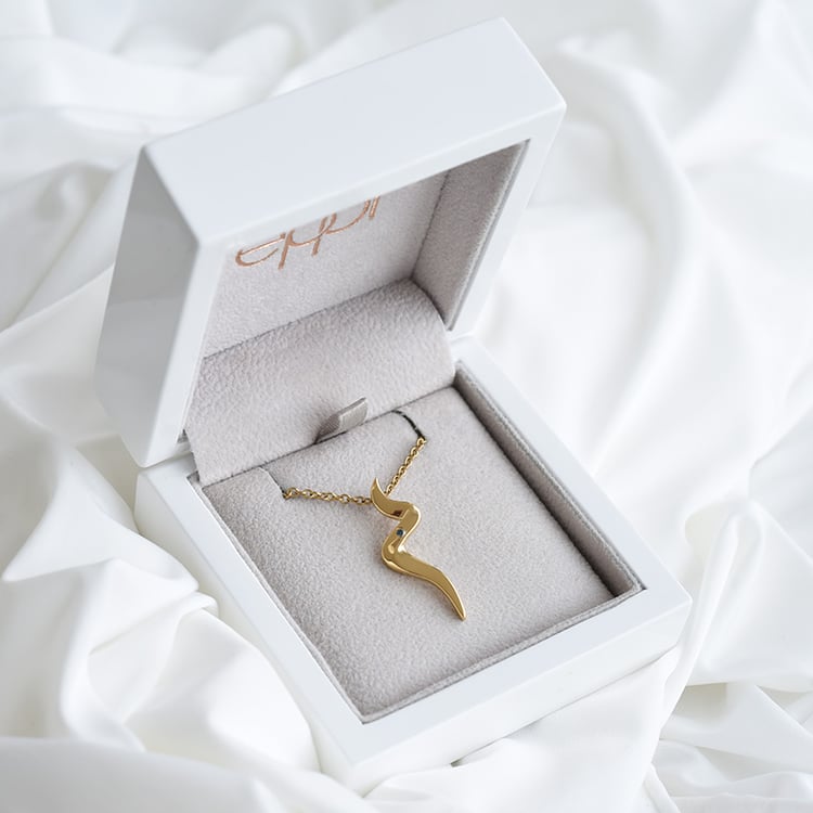 Pozlátený prívesok s modrým diamantom 86222