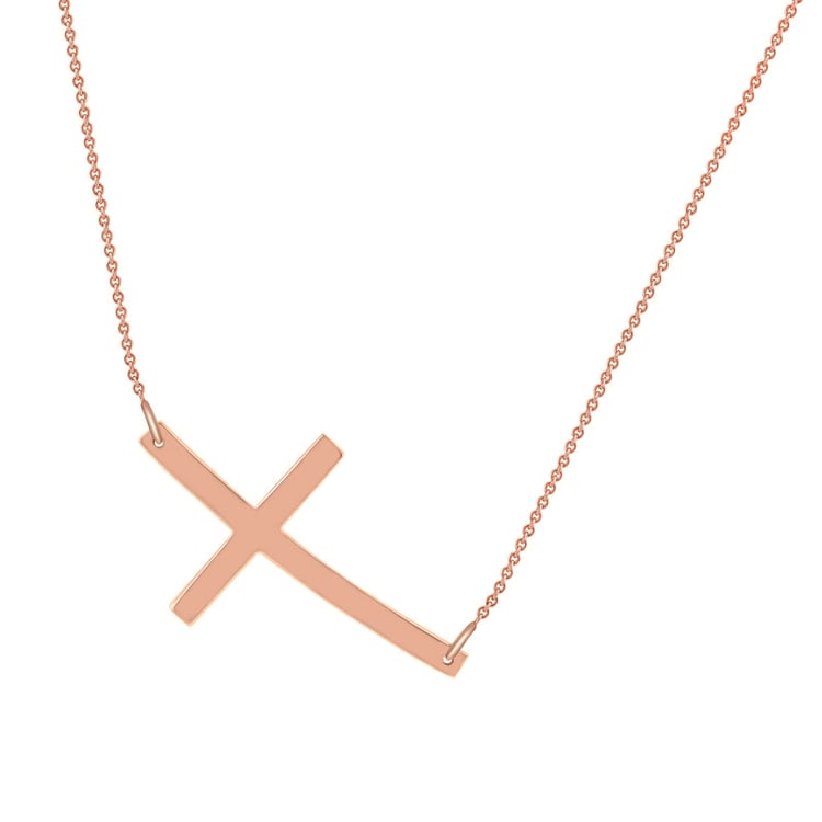 Zlatý náhrdelník v tvare krížika