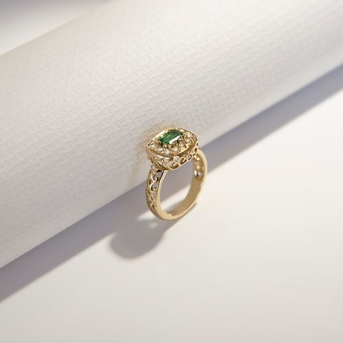 Zlatý prsteň s emerald smaragdom a diamantmi Huzil