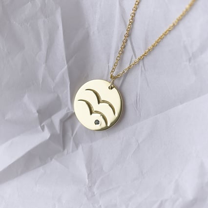 Zlatý prívesok so znamením a akvamarínom Vodnár